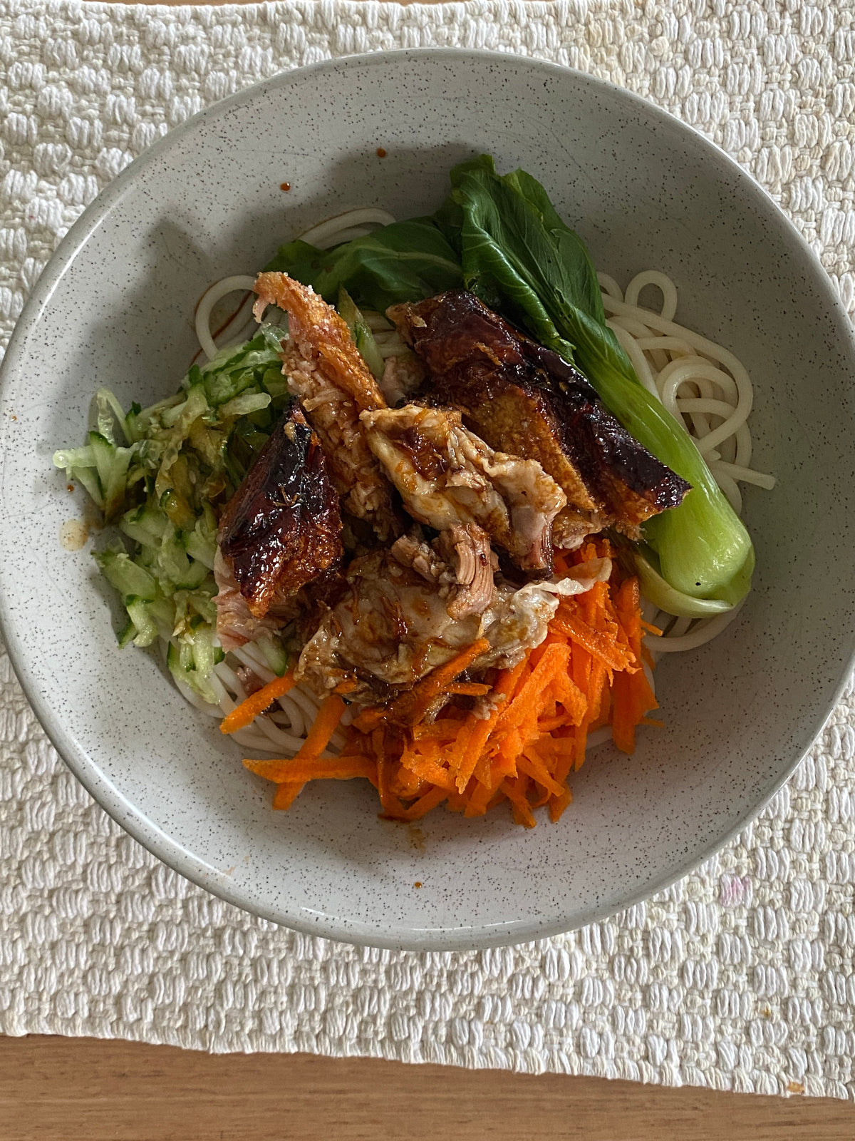 Crispy pork belly noodles