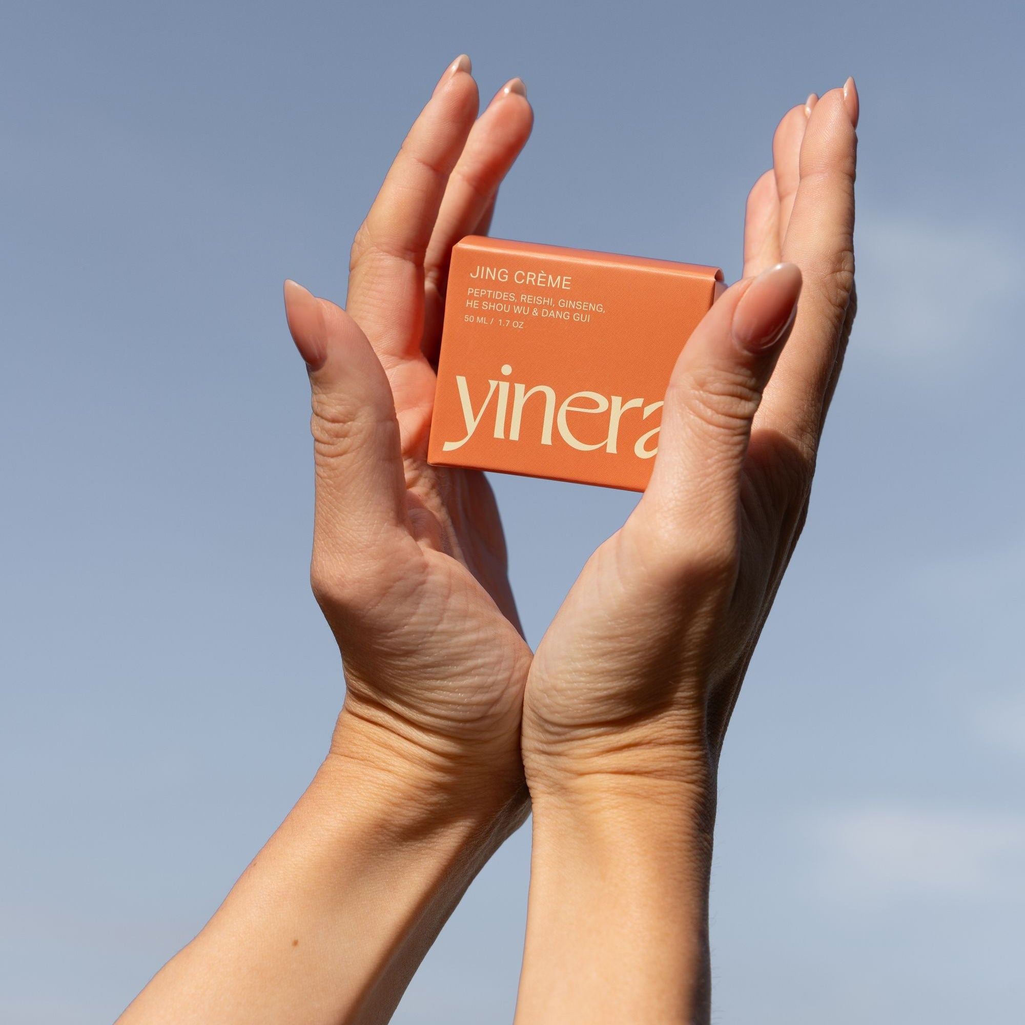 jing tallow cream | yinera tallow skincare | holding product in air