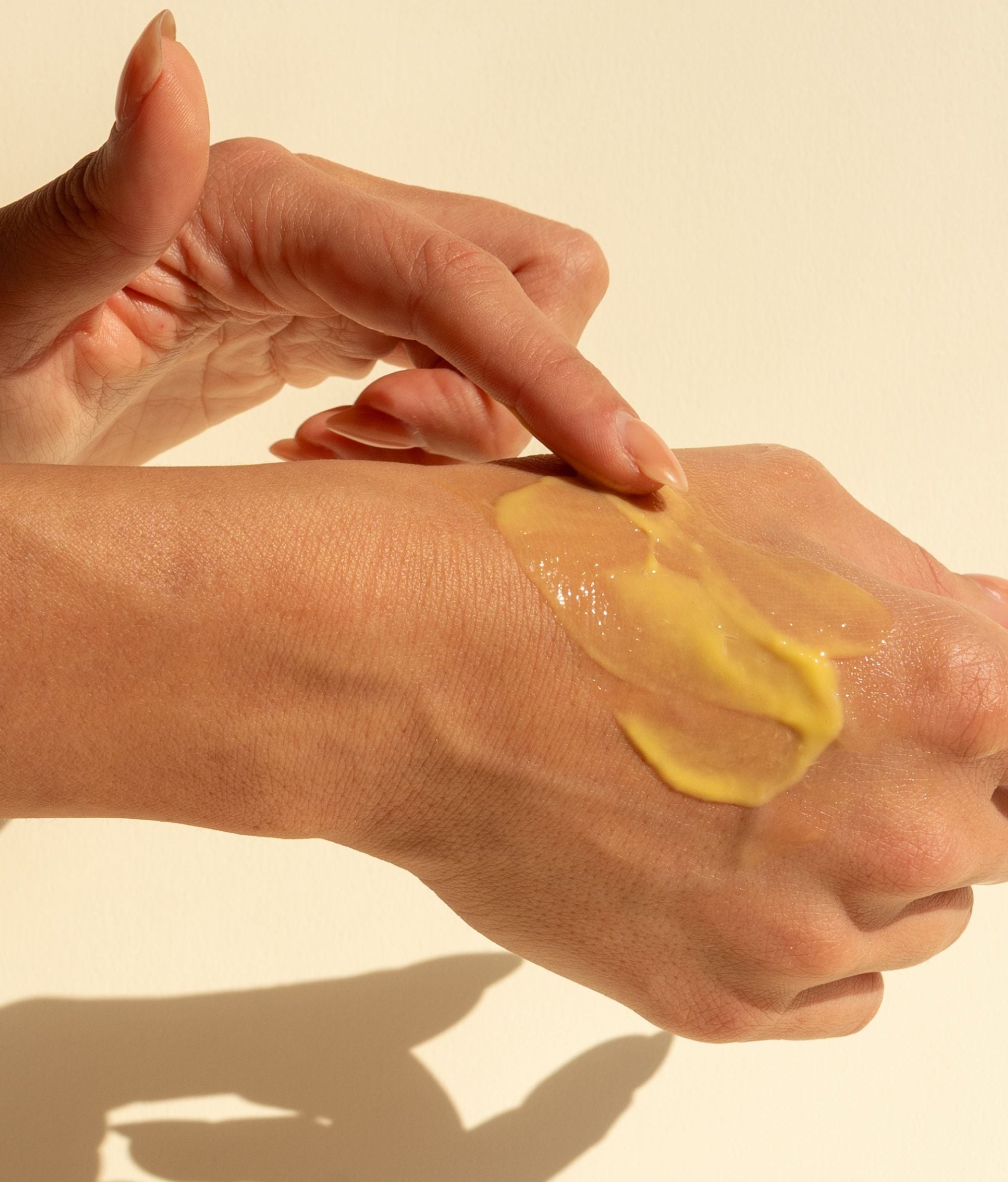 applying yellow cream | yinera tallow skincare